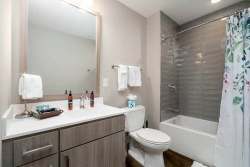 Your private bathroom features fresh linens, premium toiletries, and a relaxing tub-shower combo perfect for unwinding after your day.